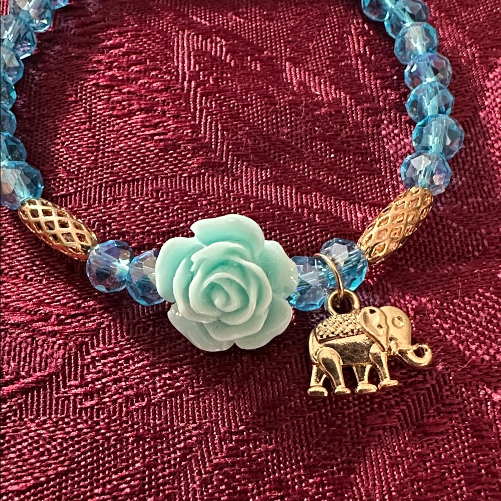 Blue Rose Bracelet with Blue Glass Beads and Gold Accents and Elephant Charm